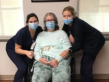 Christie Ruppel with her therapists.