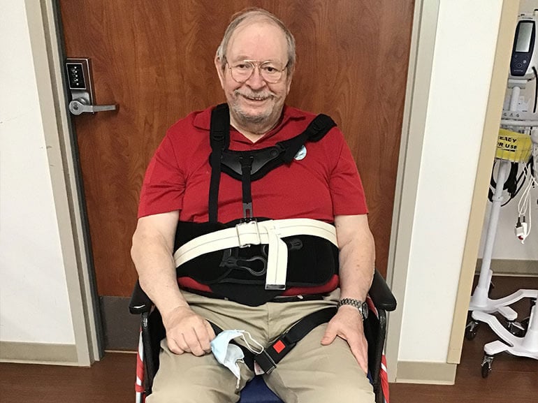 James Goertzen sitting up during a therapy session.