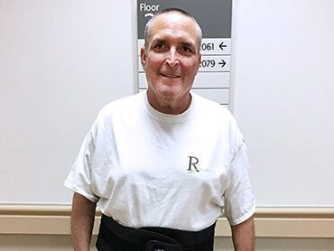 Joseph Jarreau standing after therapy.