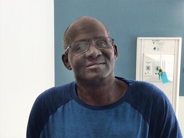 Larry Stubbs smiles after rehabilitation.