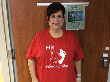 Laurie Becnel standing after therapy.